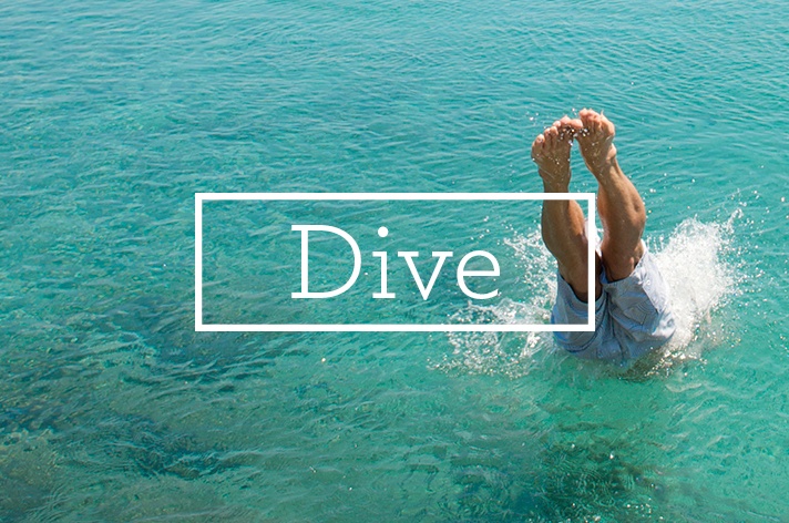 Man diving into ocean
