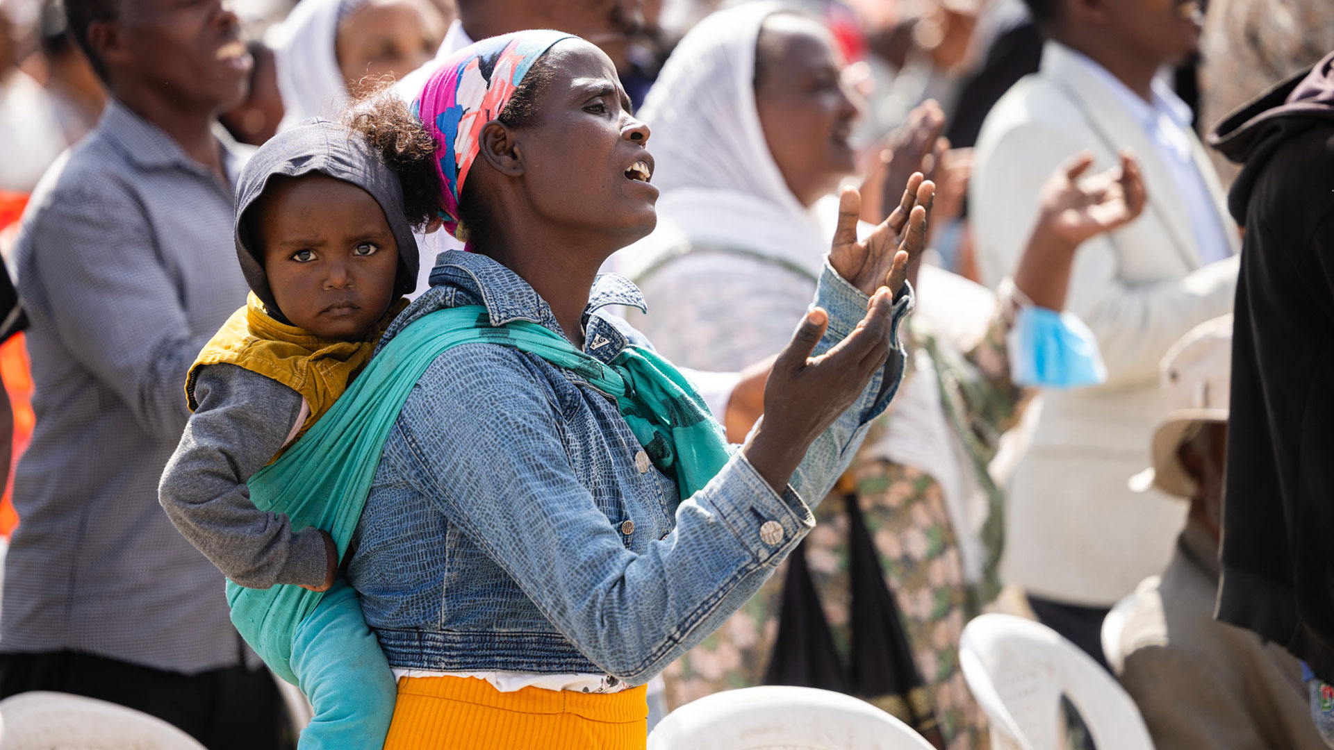 Many women carried their children in colorful wraps on their backs. The influence of a Christ-following parent can impact generations.