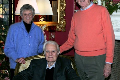 Jean Graham Ford with her brother (center) and husband, Leighton Ford (right), in 2004.