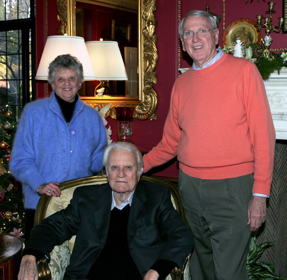 Jean Graham Ford with her brother (center) and husband, Leighton Ford (right), in 2004.