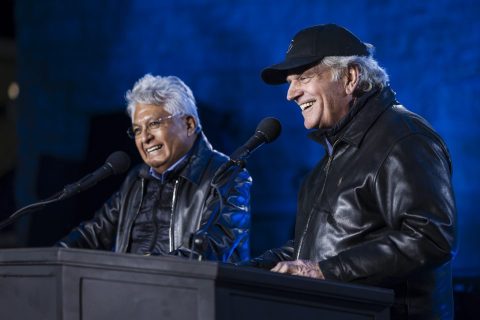 Franklin Graham—through his interpreter, BGEA evangelist David Ruiz—shares a light moment with the more than 3,000 people gathered on a chilly night at the Maverick County Amphitheatre.