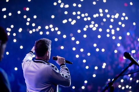 Jeremy Camp leading worship at the God Loves You Tour event in El Paso.