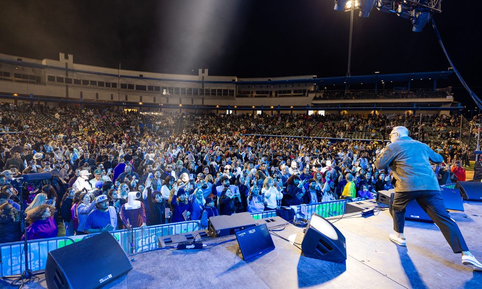 Thousands gathered to worship in Tucson’s Kino Veterans Memorial Stadium.