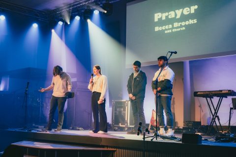 Young people leading prayers