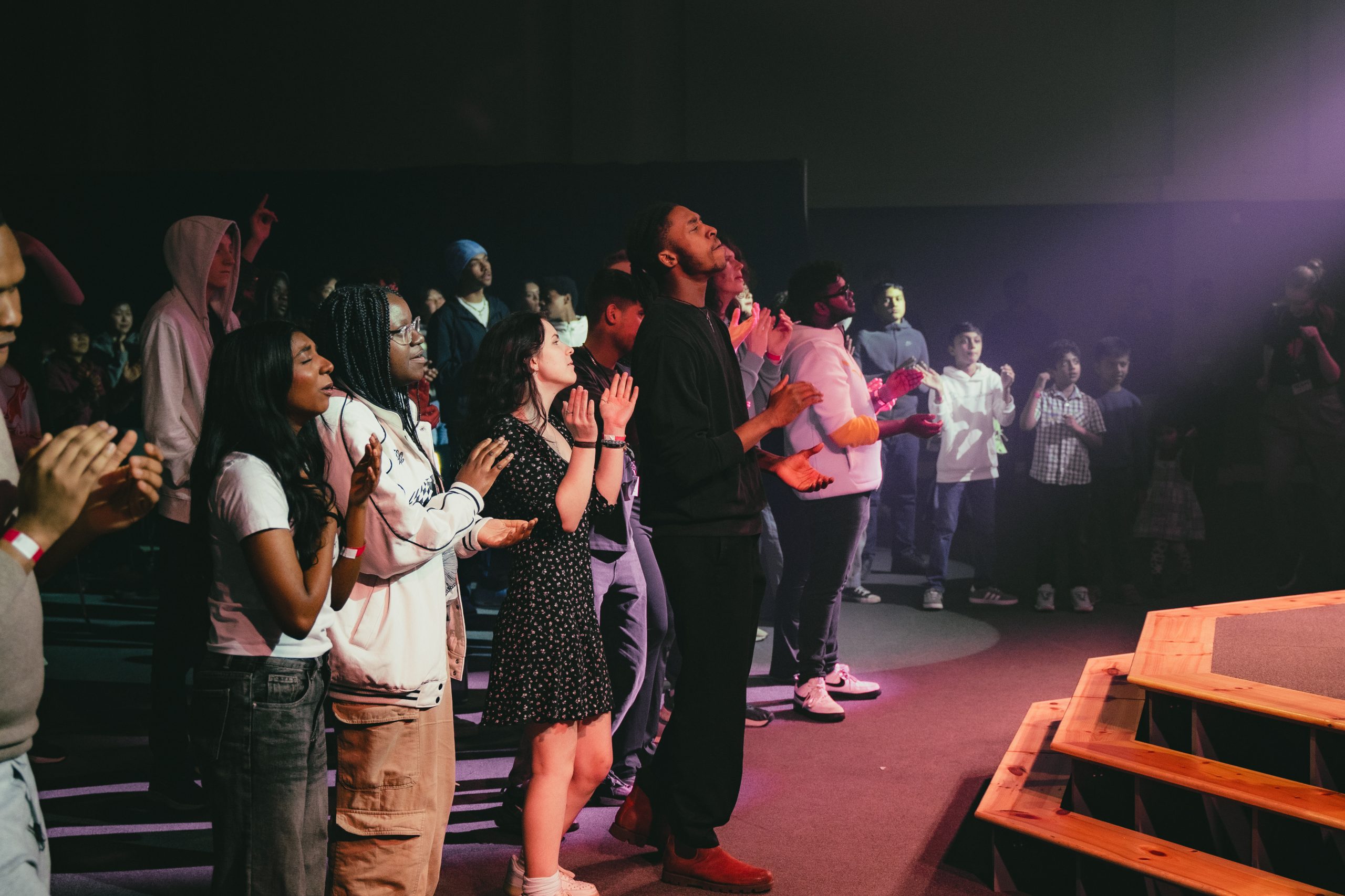 Young people worshipping