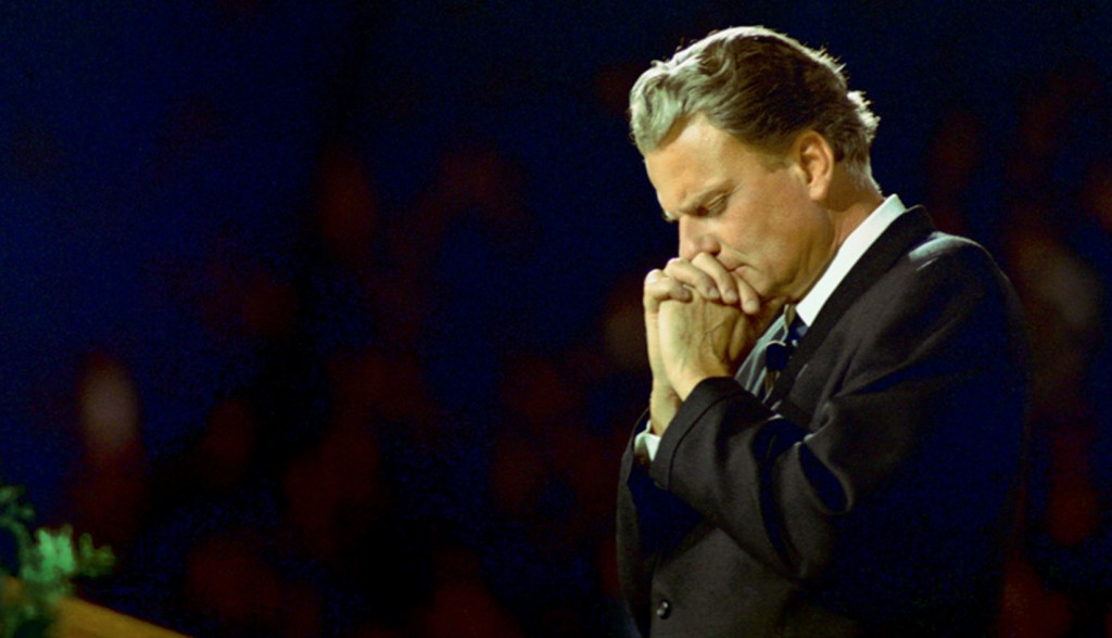 Billy Graham praying
