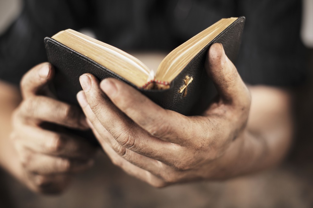 Man holding Bible