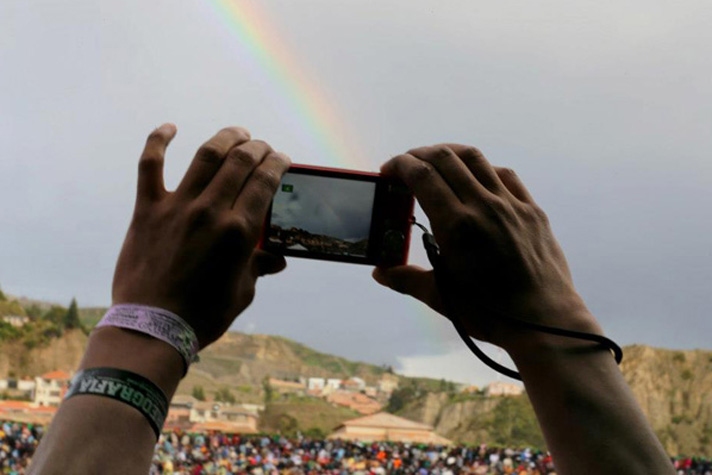 taking picture of rainbow