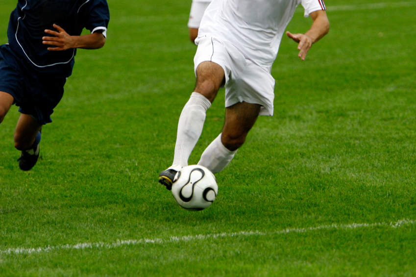men playing soccer