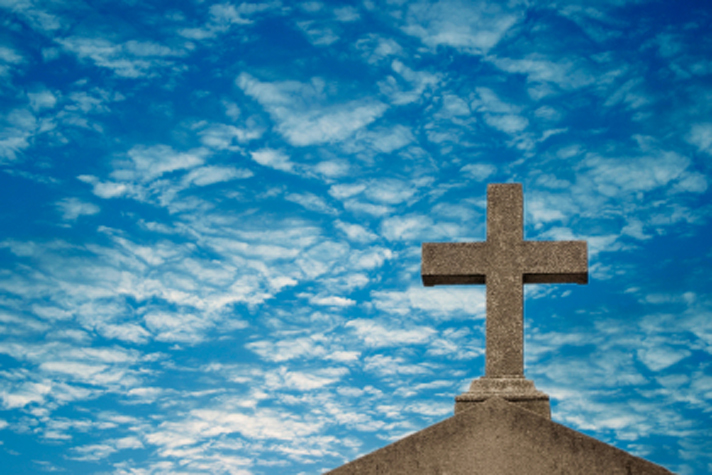 cross steeple with blue sky