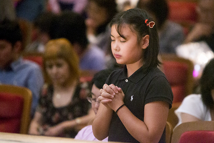 Japanese girl praying