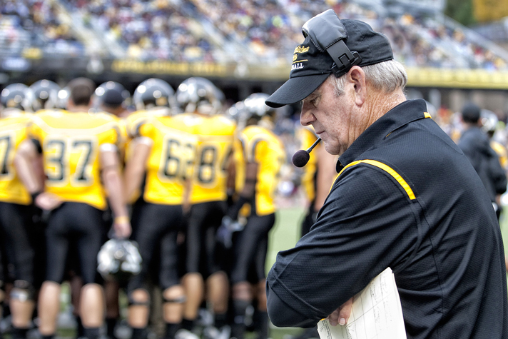 Former Appalachian State University coach Jerry Moore on the field with his team.