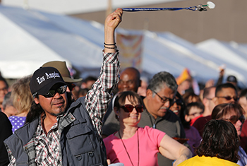 Flame got the audience involved. He asked everyone to grab an item and spin it around in the air. Young and old grabbed anything they had, event programs, sunglasses, sweatshirts or a lanyard.