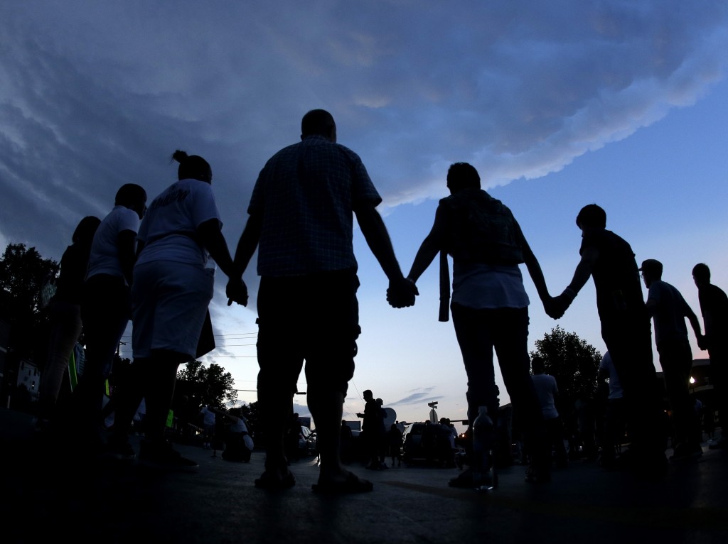 People standing in prayer