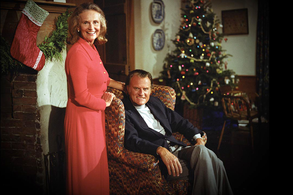 Ruth and Billy Graham by Christmas tree