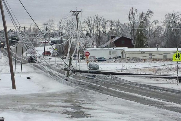 Snapped power lines block roads in Monterey, Tennessee. (Photo Courtesy of Putnam County EMS)