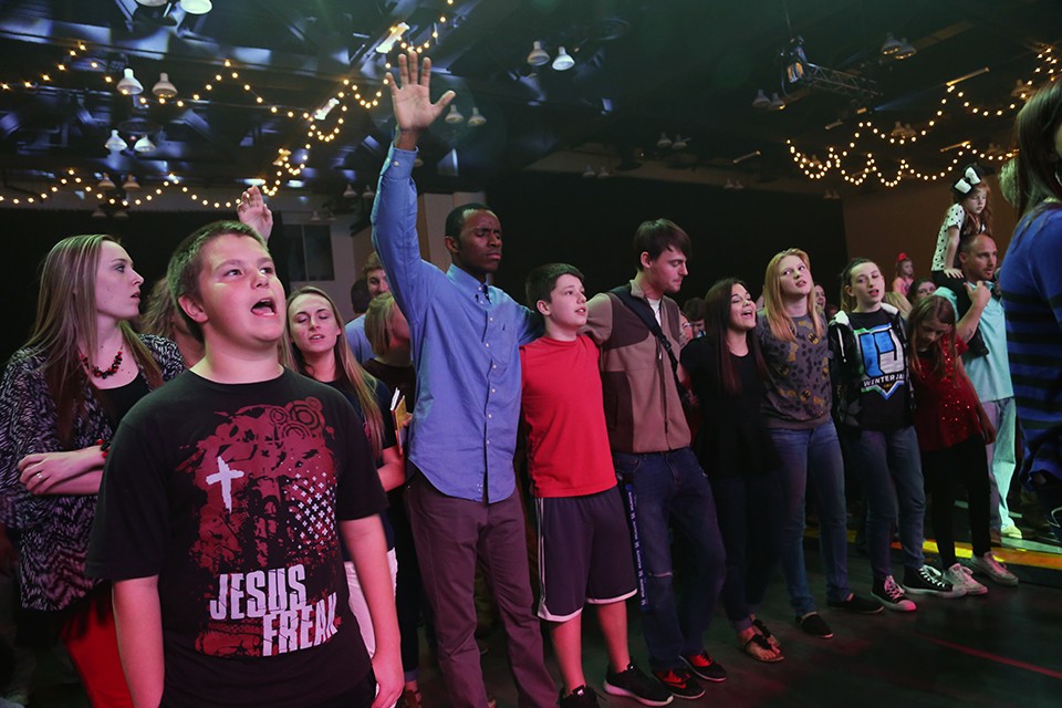 Youth worshipping and singing