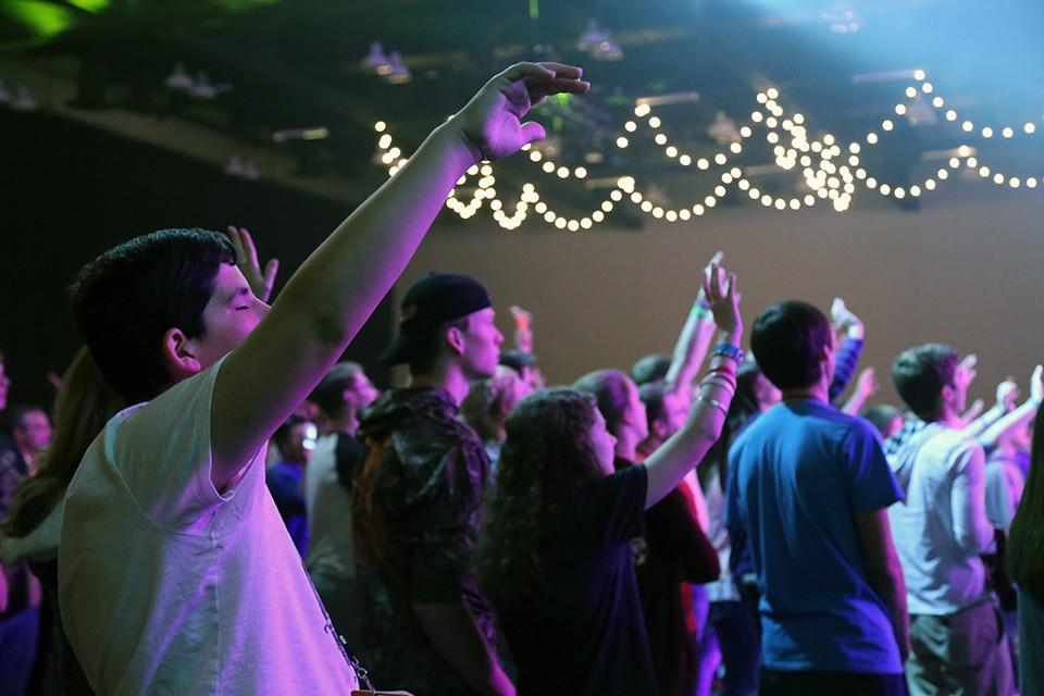 Young people worshiping