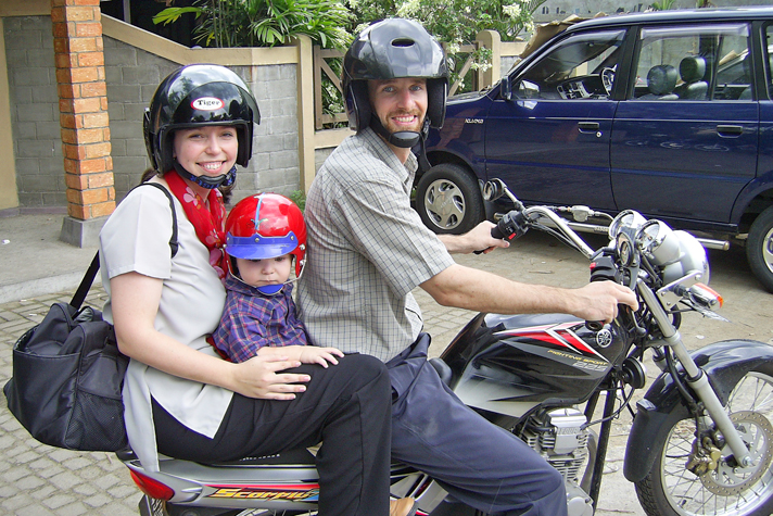 Missionary couple on motorcycle