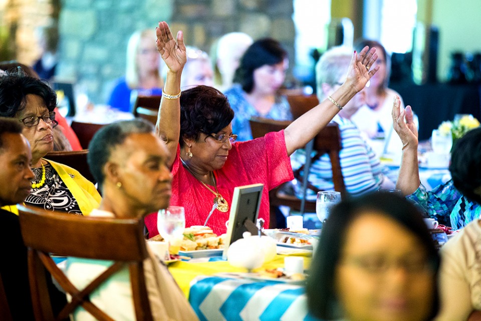 Woman raising hands