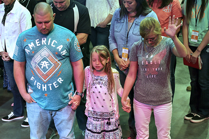 family praying