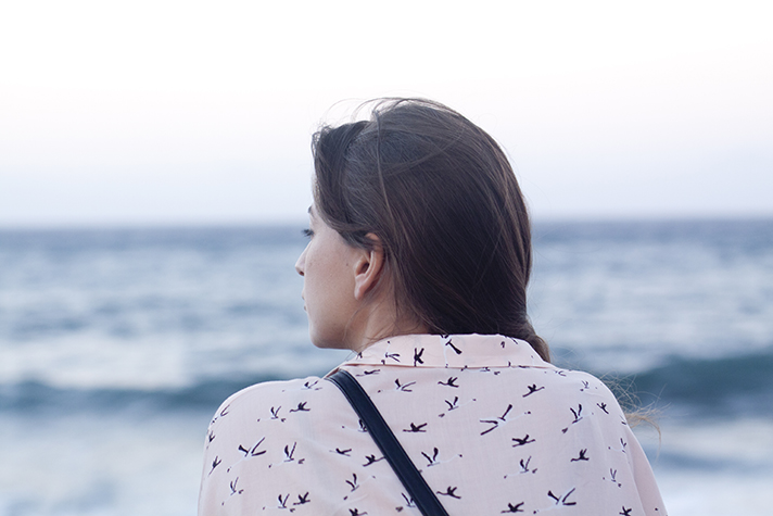 Woman by water