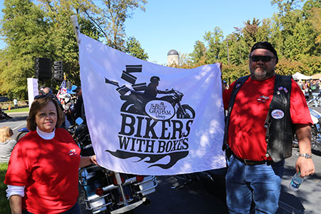 Brenda and John Rumley bought a flag from the Billy Graham Library last year. This year, they displayed it during their ride to the Library from Greensboro, North Carolina. 