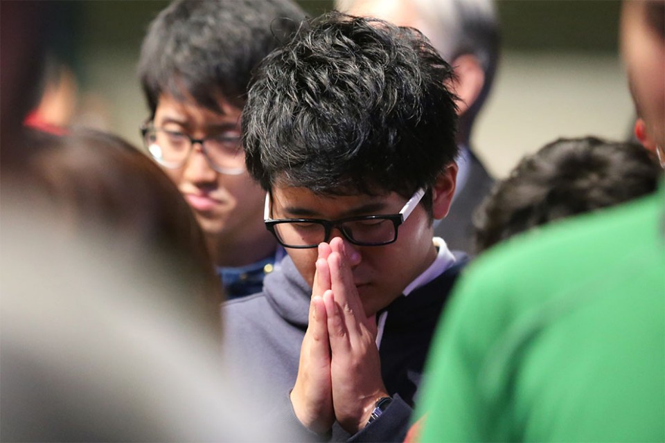 Young man praying