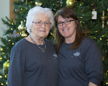 Doris and Kenda in front of Christmas tree