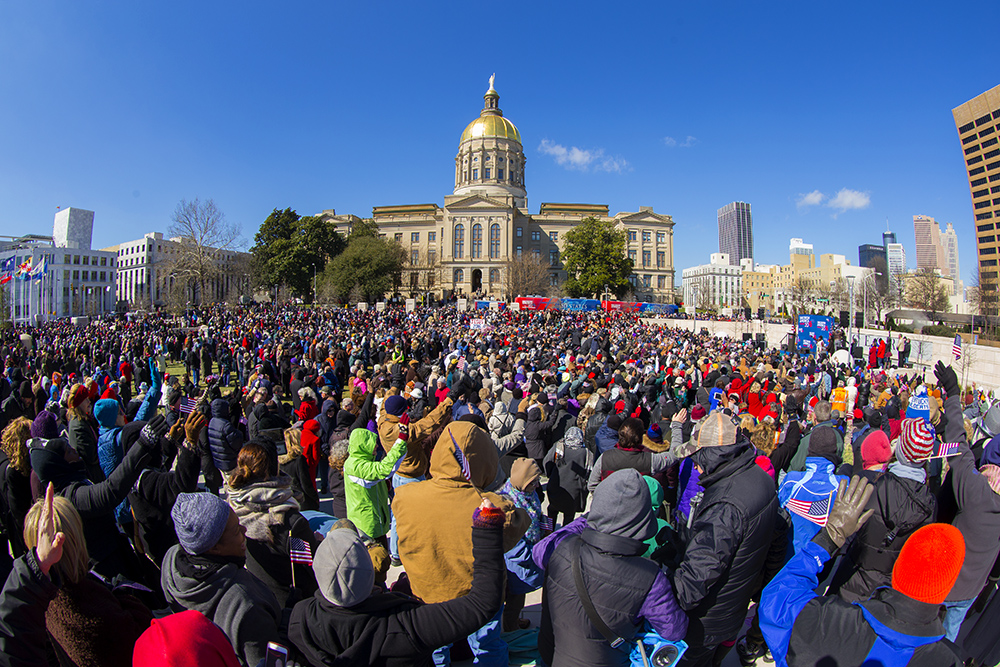 Thousands standing around State Capitol