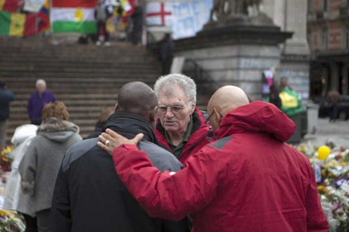 Man and chaplains praying