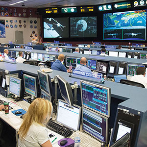 DATE: 8-12-14 LOCATION: Bldg. 30 - FCR-1 (30M/231) SUBJECT: ISS Flight Controllers during docking of the "Georges Lemaitre" Automated Transfer Vehicle-5 to the aft port of the Zvezda Service Module. PHOTOGRAPHER: Lauren Harnett