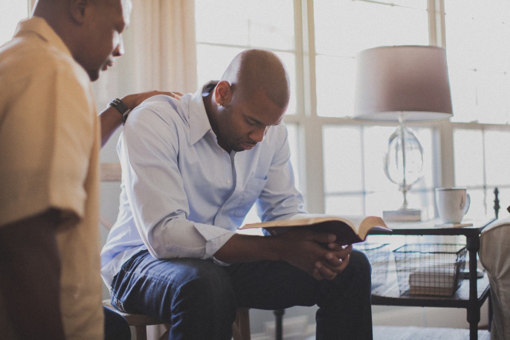 Men praying