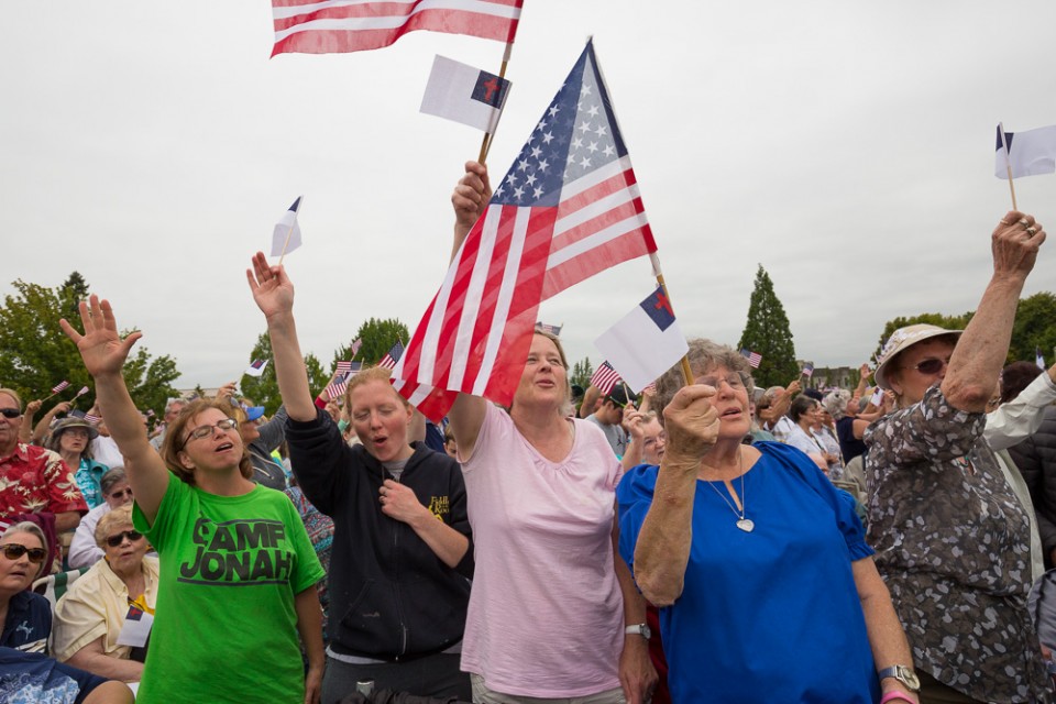 Women waving flags