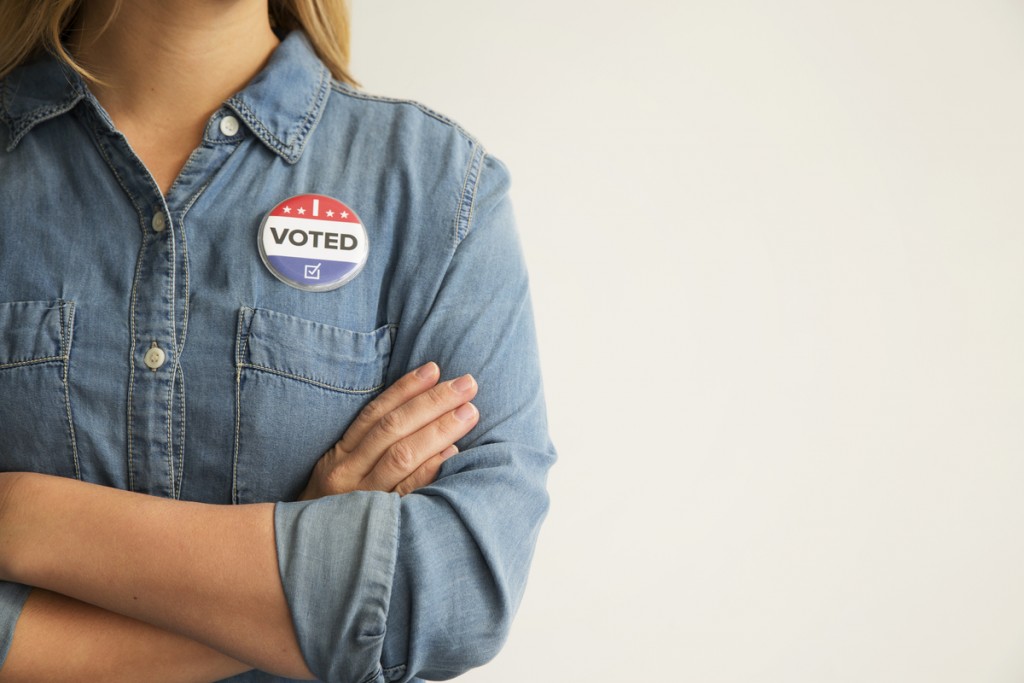 Woman with voting pin