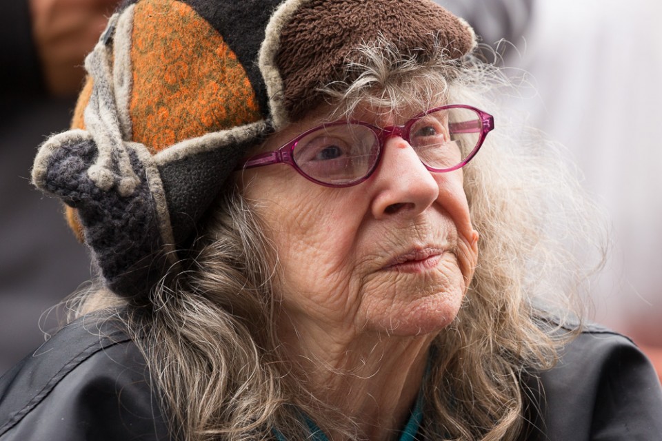 Elderly woman listening