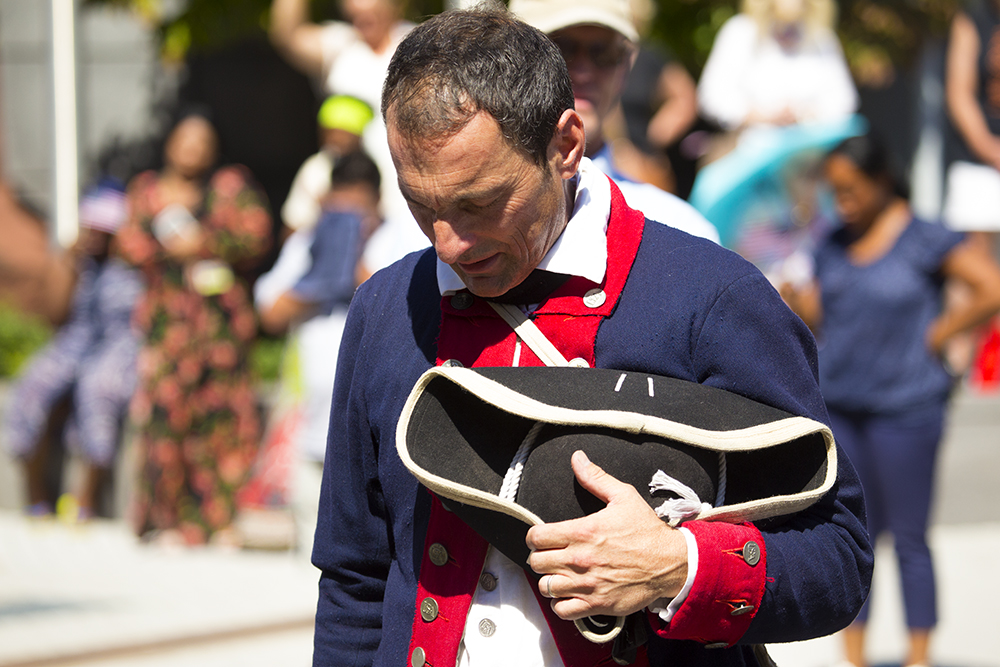 David Jackson praying in Revolutionary War costume