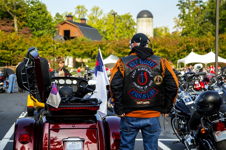 The back of a biker's jacket as he faces the Library