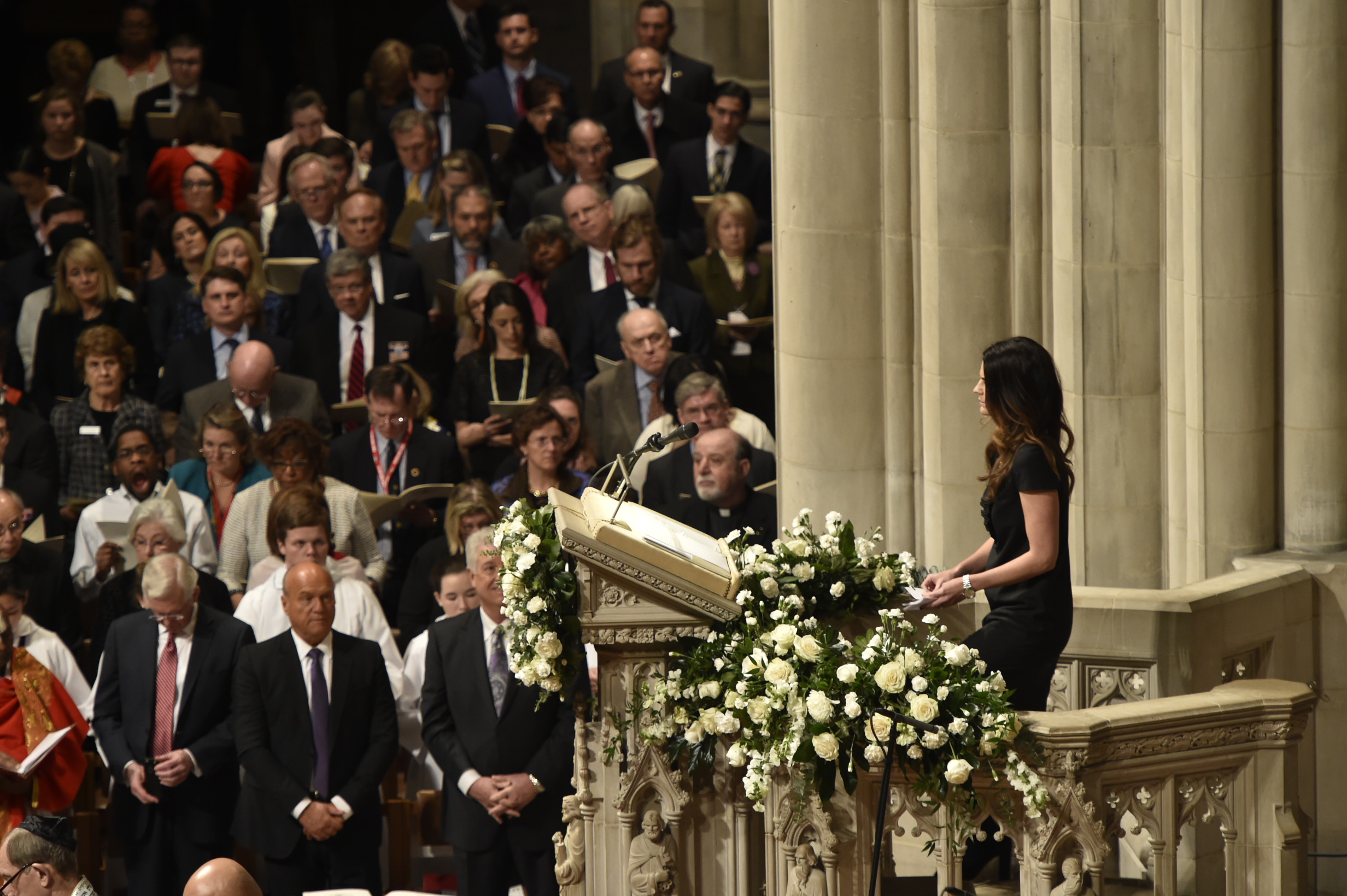 Cissie Graham Lynch standing behind podium at Washington National Cathedral