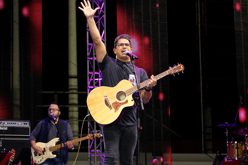 Daniel Calveti with guitar onstage
