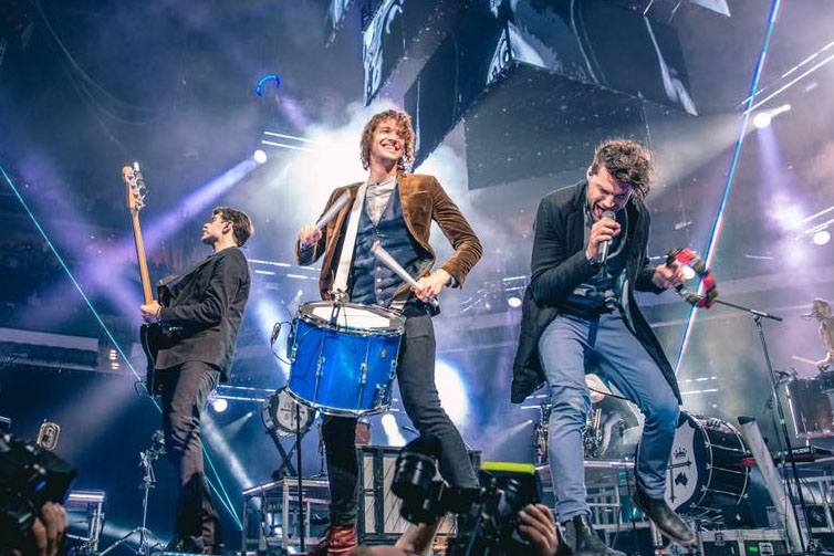 For King & Country brothers Luke Smallbone and Joel Smallbone and band members with drum, guitar, singing