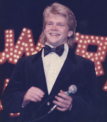 Steven Curtis Chapman in a suit and mullet