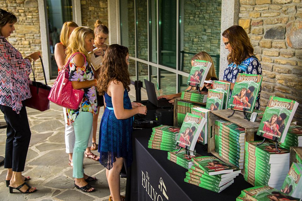People standing in line to buy Missy Robertson's book, Blessed, Blessed ... Blessed