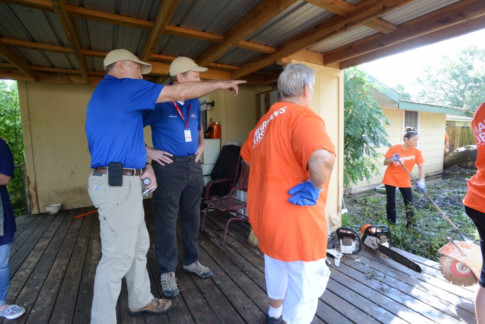 Chaplains with Samaritan's Purse volunteers at a home