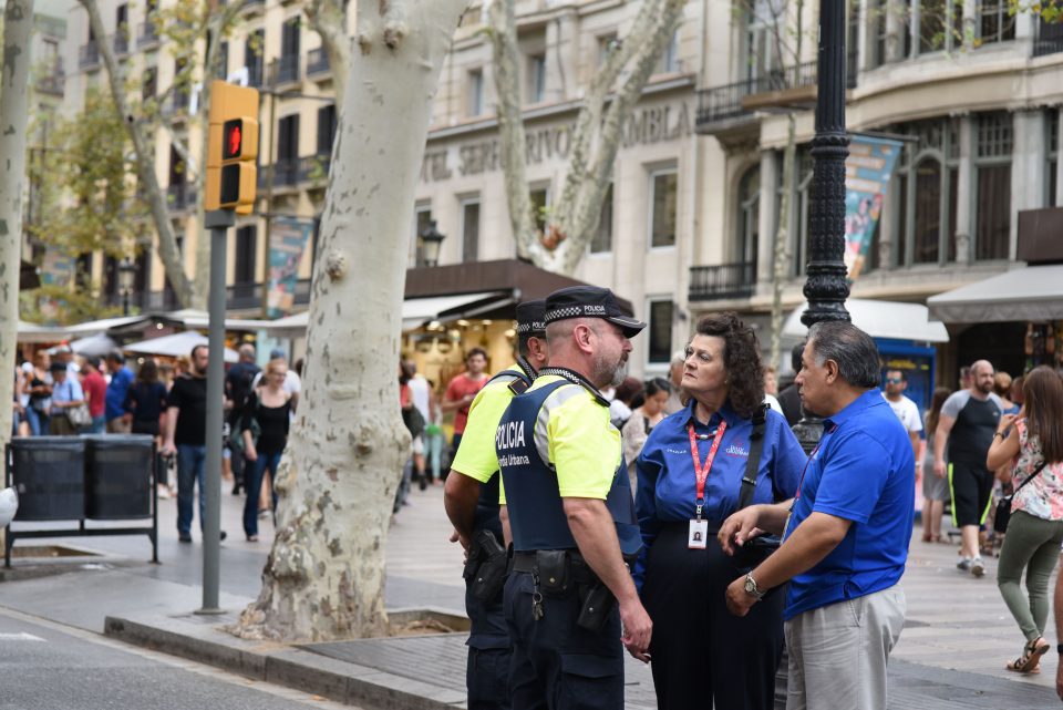 Desi and Carolin Perez in Barcelona with police officers