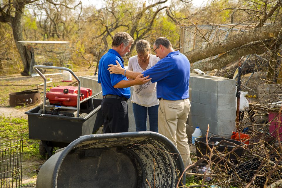 chaplains praying with woman in South Texas