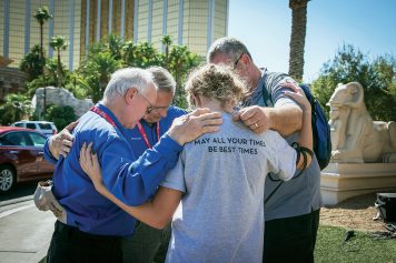 Chaplains praying with man and woman