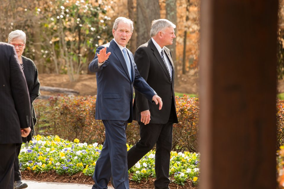 Bush waves good-bye at the end of his visit