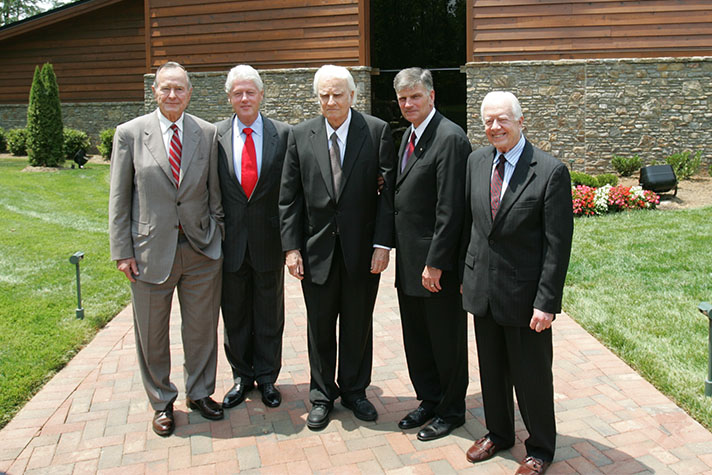 Presidents George H.W. Bush, Bill Clinton and Jimmy Carter with Billy and Franklin Graham at the dedication of the Billy Graham Library