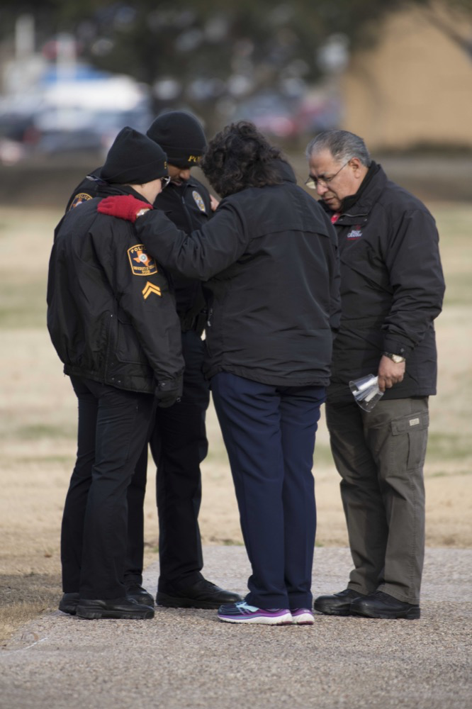 Chaplains pray with first responders